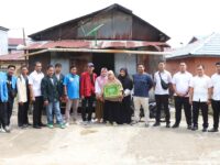 Polres Bontang Gelar Bakti Sosial Bersama Mahasiswa dan KNPI, Bagikan 100 Paket Bantuan